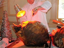 Load image into Gallery viewer, Rotisserie Whole Steamship of Beef. Flame Show Cooking Catering or Drop Off Catering
